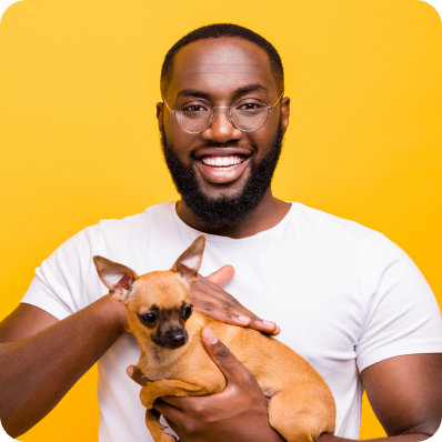 Man holding small dog