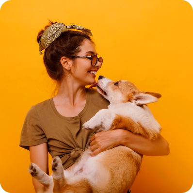 Woman holding her dog