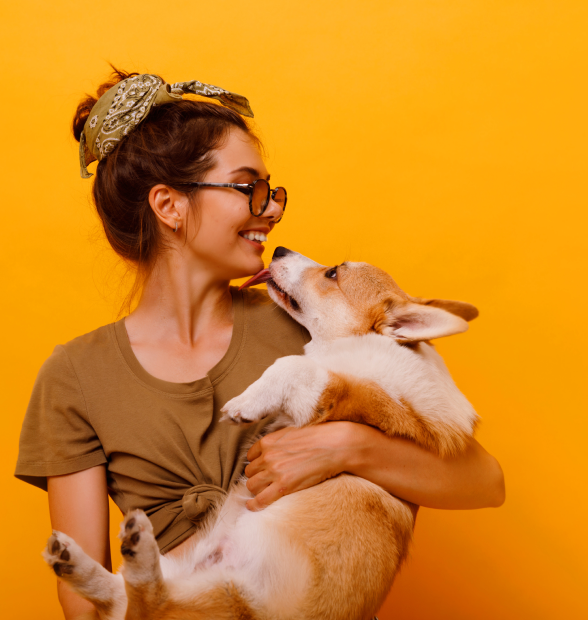 Woman holding her dog